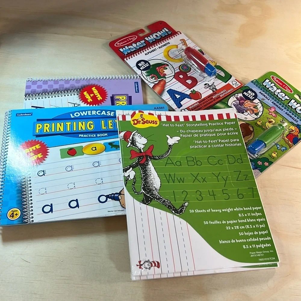 Melissa and Doug Water Wow and Write and Wipe books and dr. Seuss writing paper